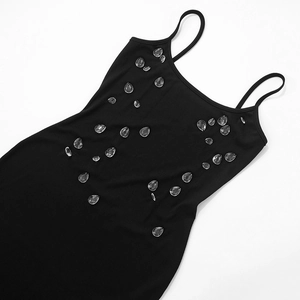 Detail of black ribbed knit fabric with teardrop rhinestones on sleeveless dress