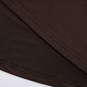 Detail of the high-quality overlock stitching and double-needle seams on dark brown dress