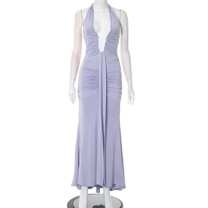 Detail of lavender halter neck dress showing deep V-neckline and waist ruching design