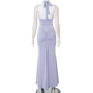 Back view of elegant lavender halter neck ruched maxi dress with bow tie detailing