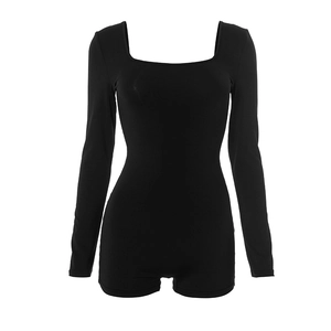 Close-up of black long sleeve bodycon romper showing U-neckline and smooth fabric texture