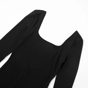 Detail of black long sleeve bodysuit with U-neck design and sleek knit texture