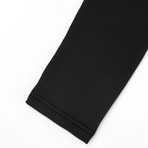 Detailed close-up of high-elastic black knit fabric with professional double-needle stitching