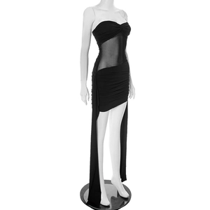 Detail of black strapless mini dress with sheer mesh paneling and asymmetric draping fabric