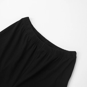 Detail of high-elasticity elastic waistband on black knitted wide-leg trousers