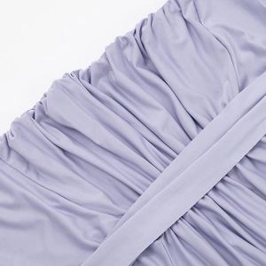 Detail of lavender ruched fabric with elegant pleated texture and a matching strap