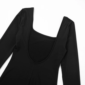 Detail of the deep U-neckline and high-quality knit texture on this black bodysuit