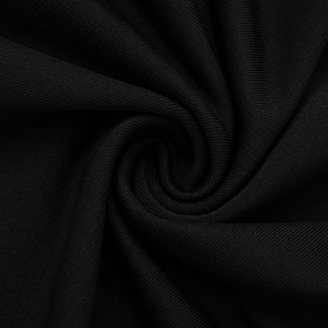 Close-up of premium black ribbed knit fabric showing soft texture and vertical patterns