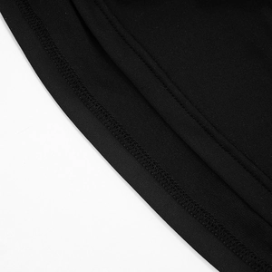 Close-up of the double-needle hem and knitted fabric texture on a sexy bodycon dress