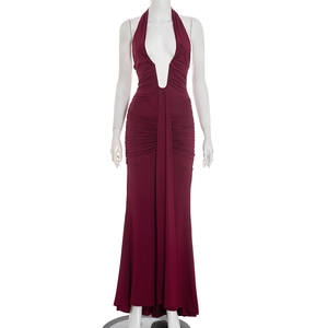 Close-up of wine red halter V-neck dress featuring ruched details and backless design