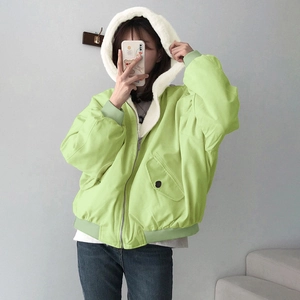Close-up of light green fleece-lined hooded jacket with zipper and large utility pockets