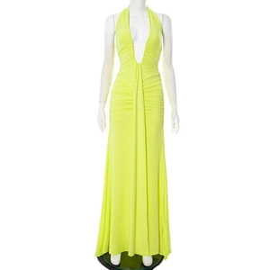 Detail of the pleated waist design and deep V-neckline on this fluorescent green maxi dress