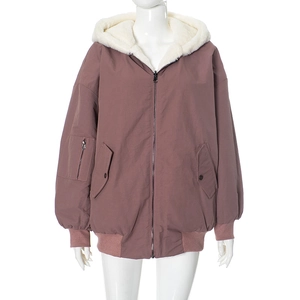 Close-up of pink hooded jacket with white sherpa lining and utility sleeve pocket
