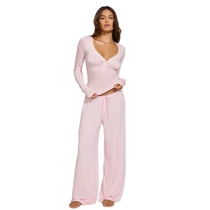 Women's pink two-piece casual set with long sleeve henley top and wide leg pants