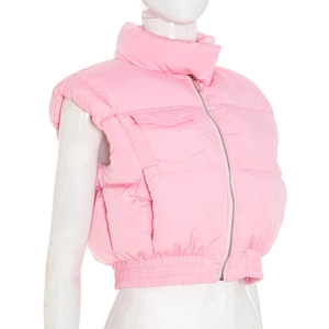 Close-up of pink puffer vest with standing collar, silver zipper, and ribbed hem detail