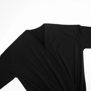 Close-up detail of the deep V-neck wrap design on this black long sleeve mini dress