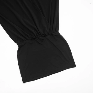 Detail of black V-neck mini dress showing gathered waist and draped jersey fabric texture