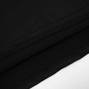 Close-up of precise double-needle stitching and inner overlock hem on a black dress