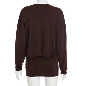 Back view of deep brown long sleeve dress featuring batwing sleeves and bodycon fit