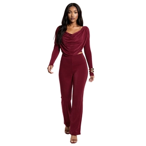Elegant deep red two-piece lounge set with draped cowl neck top and high-waist wide-leg pants