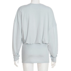 Detailed back view of light blue-grey mini dress with batwing sleeves and ruched waist