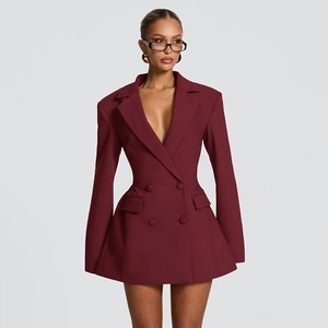 Detailed view of burgundy double-breasted blazer dress with slim waist and A-line skirt