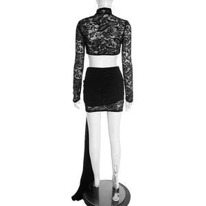 Detail view of lace crop top and skirt set with flowing ribbons on the back