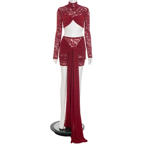 Detail of burgundy lace two-piece set featuring long sleeve top and skirt with long sashes