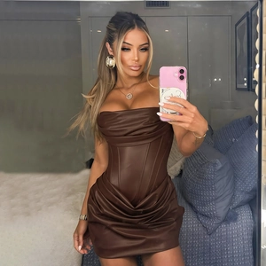 Detail of brown PU leather strapless dress featuring boned corset waist and ruched A-line skirt