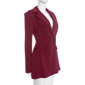 Detail view of the slim-fit burgundy double-breasted blazer dress with notched lapels