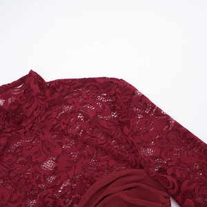 Detail of burgundy floral lace fabric and pleated texture on long sleeve two-piece set