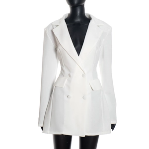 Detail of white slim-fit double-breasted blazer dress with notched lapels and decorative pockets