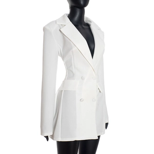Detail of white double-breasted dress with flap pockets and slim fit tailored design