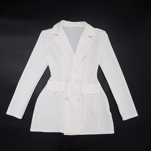 Detailed flat lay of a white double-breasted blazer dress with decorative flap pockets