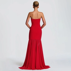 Detailed back view of a red strapless evening dress with pleated mermaid hem