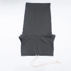 Detail of gray pet neck warmer with drawstring hem and soft knitted texture