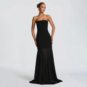 Elegant strapless black maxi dress with a ruffled mesh hem for a sophisticated look