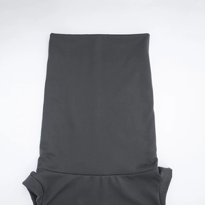 Detailed macro view of charcoal grey high-elastic knit fabric with smooth seamless texture