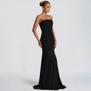 Detail of elegant black strapless mermaid dress with chiffon stitching and draped pleats