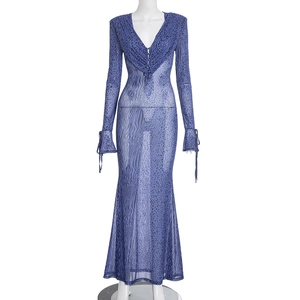 Detail of V-neck mesh dress with leopard print, decorative buttons and flare sleeves