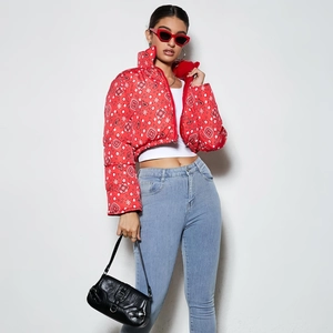 Detail of red paisley print reversible jacket with stand collar and zipper closure