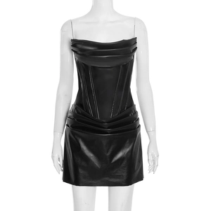 Detailed view of the corset-style boning and gathered texture on this black PU leather dress