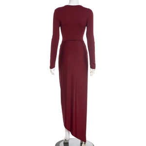 Detailed back view of a slim-fit wine red dress featuring an elegant high side slit design