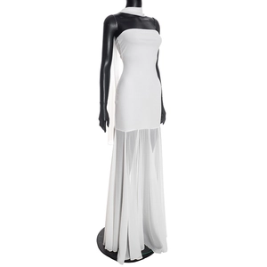 Detail of white strapless tube dress with chiffon fish-tail hem and neck scarf