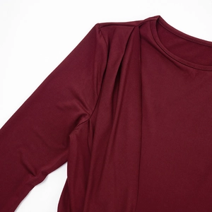 Detail of round neckline and pleated shoulder on wine red slim long sleeve dress
