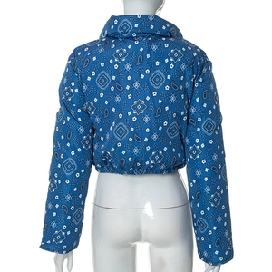 Detailed back view of a blue paisley printed quilted jacket with elasticated waist hem