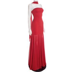 Detail of red strapless evening gown featuring elegant chiffon scarf and pleated skirt