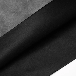 Macro detail of black functional fabric texture and inner lining of the PU strapless dress