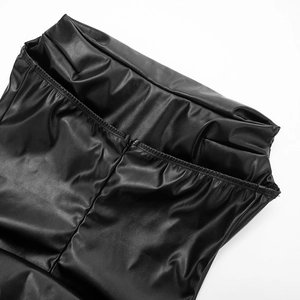 Close-up of solid color PU leather dress featuring a hidden zipper and fine stitching details