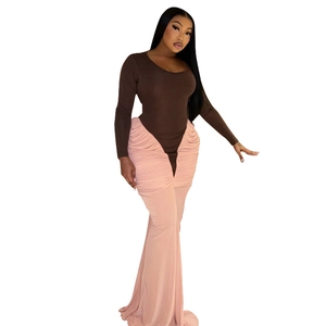 Elegant long sleeve maxi dress featuring a brown bodice and pink pleated fishtail skirt